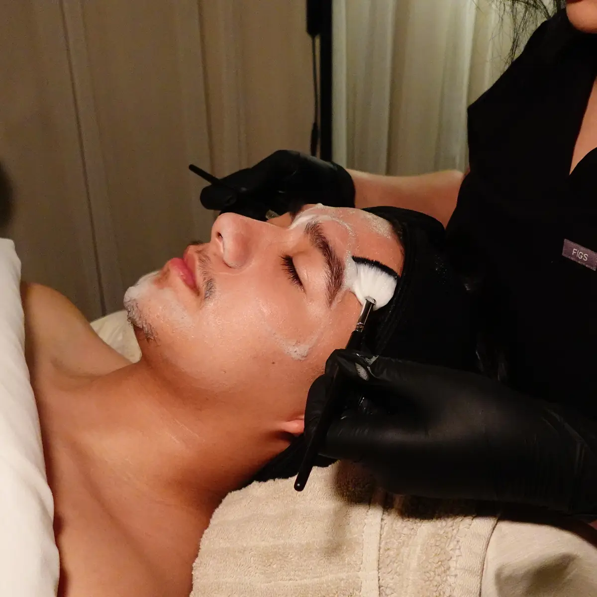 Deep cleanse and facial hair steaming step of the Gentleman's Skin Reset Facial around the beard and goatee
