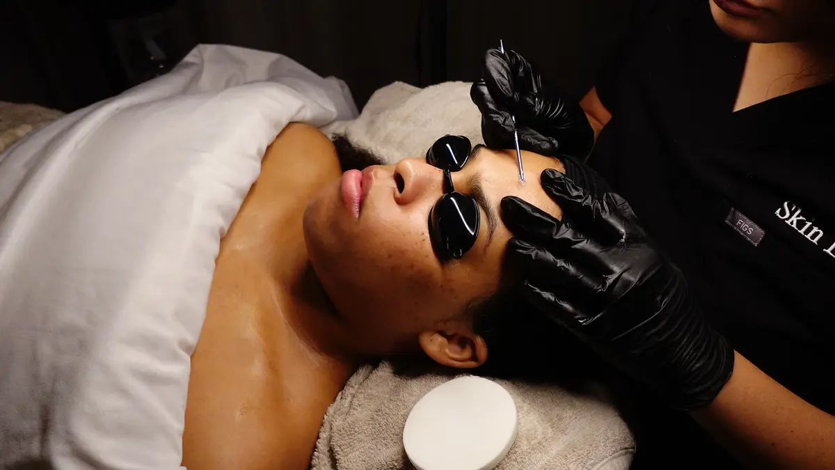 Targeted serum being applied during the Luxe Skin Reset Facial to treat dark spots and dullness